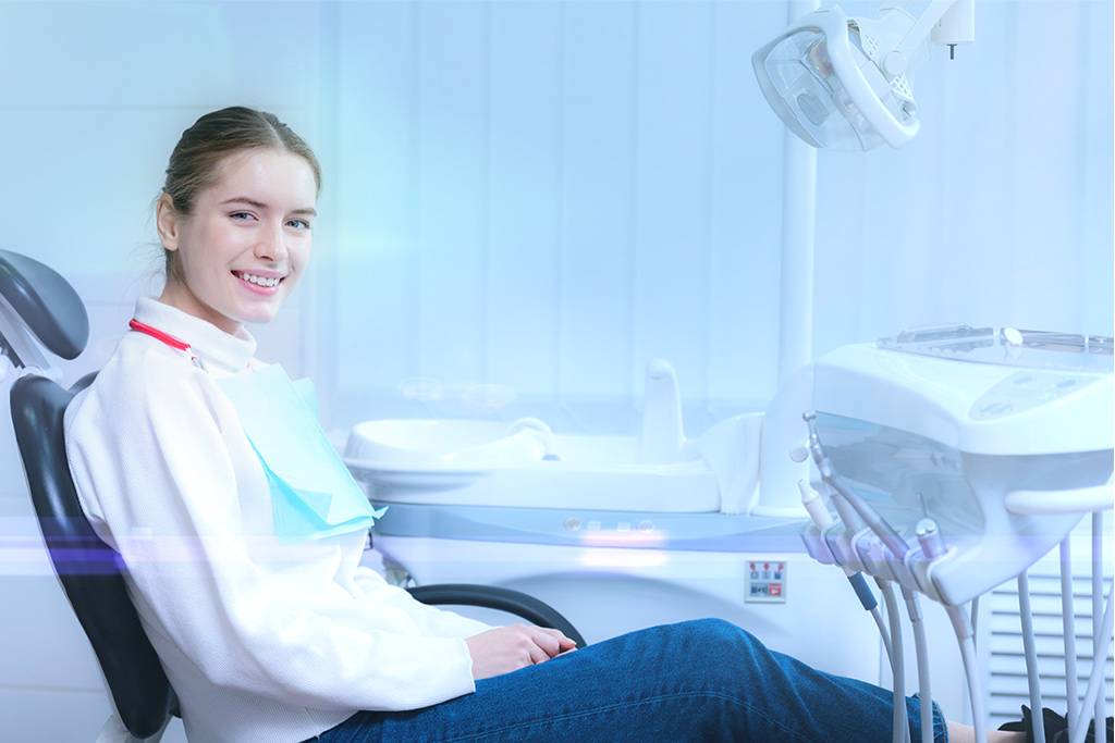 Smile poster at Elite Smile Clinics - dental comfort promise